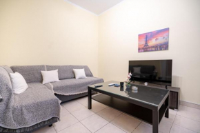 Neos kosmos metro st. 1 bedroom semi-basement flat